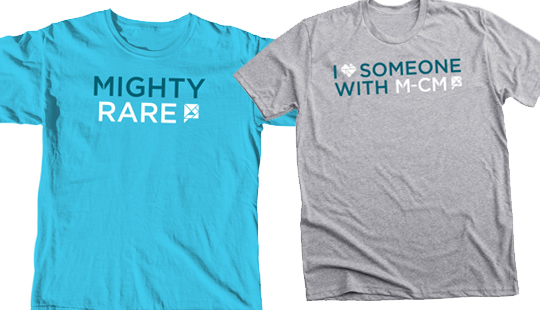 photo of two t-shirts, a blue shirt says MIGHTY RARE and a grey shirt says I heart SOMEONE WITH M-CM